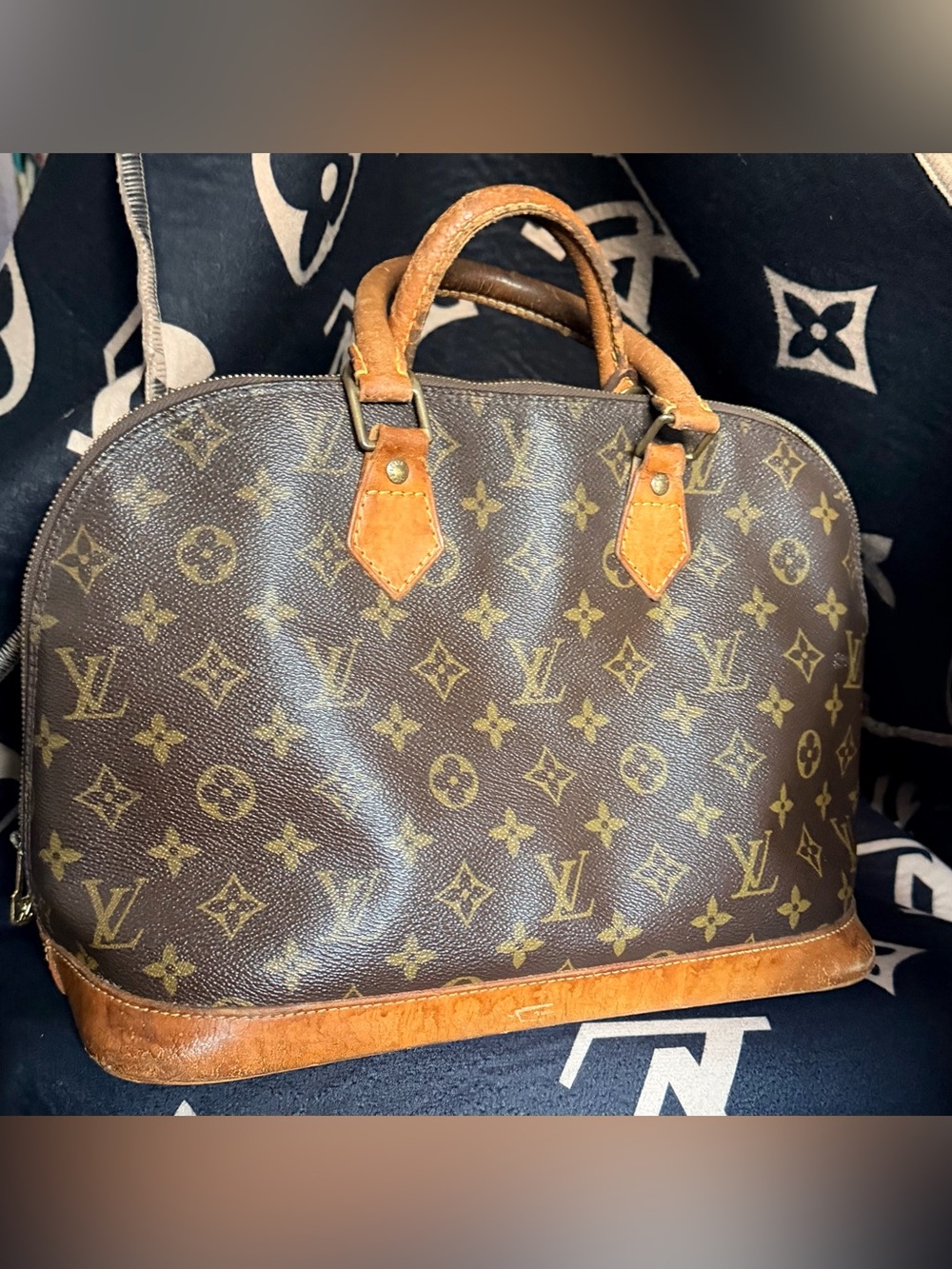 Authentic Louis Vuitton Alma with Authentication.